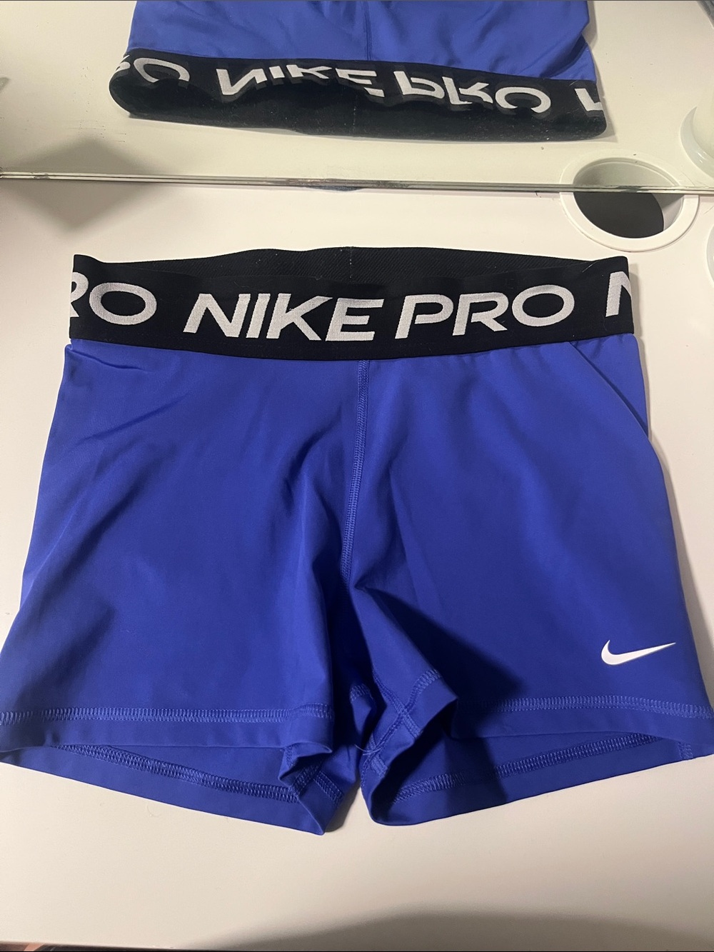Nike Pro Women’s Royal Blue Athletic Shorts with Black Waistband